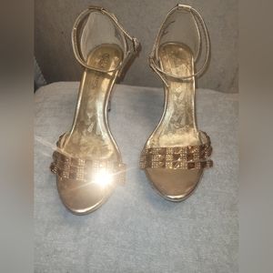 Gold bedazzled 4-inch heels. Size 8.